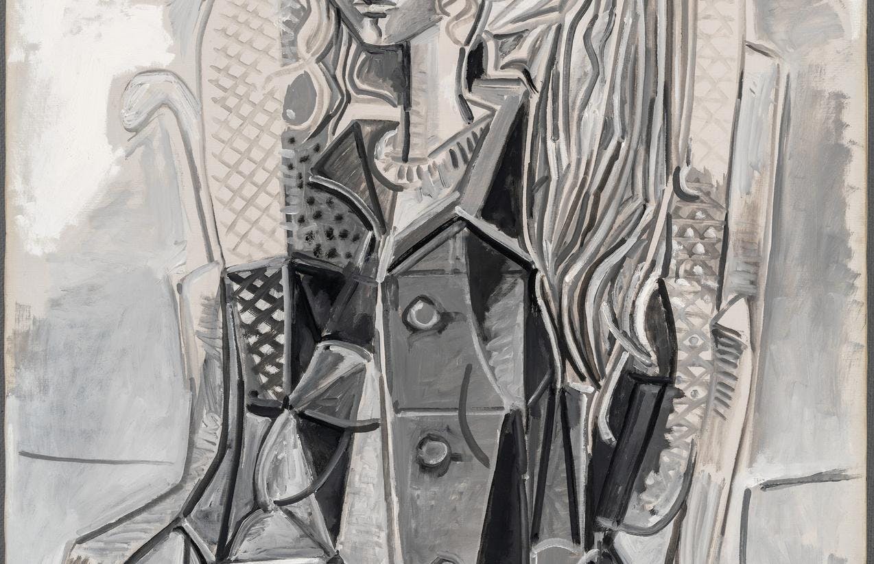 Et maleri av Pablo Picasso, som viser en delvis abstrakt framstilling av en kvinne, i sorte og grå toner